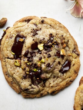 A large pistachio chocolate chip cookie.