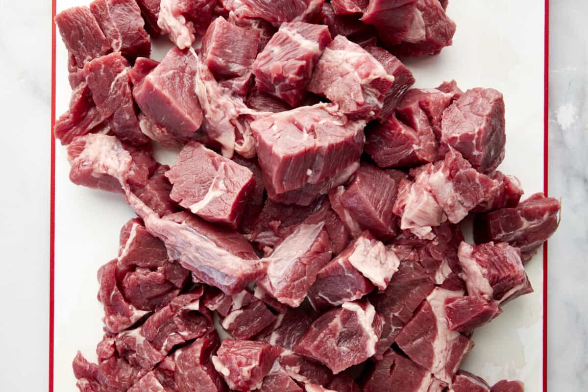 Raw cubes of stew meat. 
