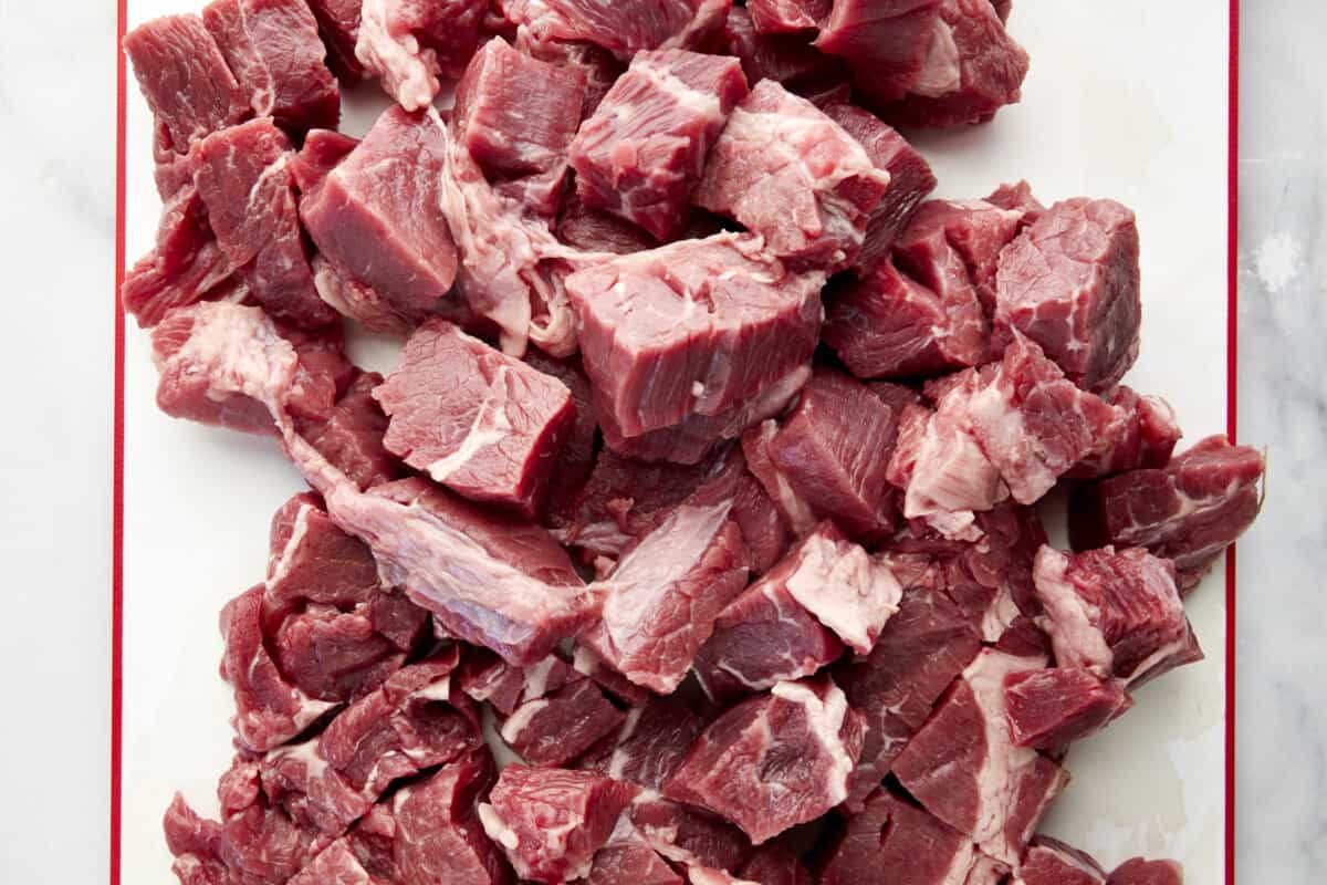 Raw cubes of stew meat.