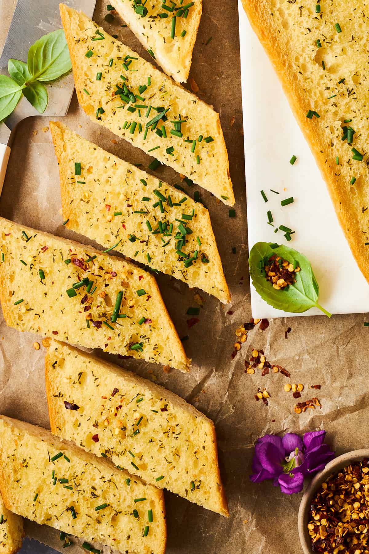 Easy garlic bread slices topped with parsley. 