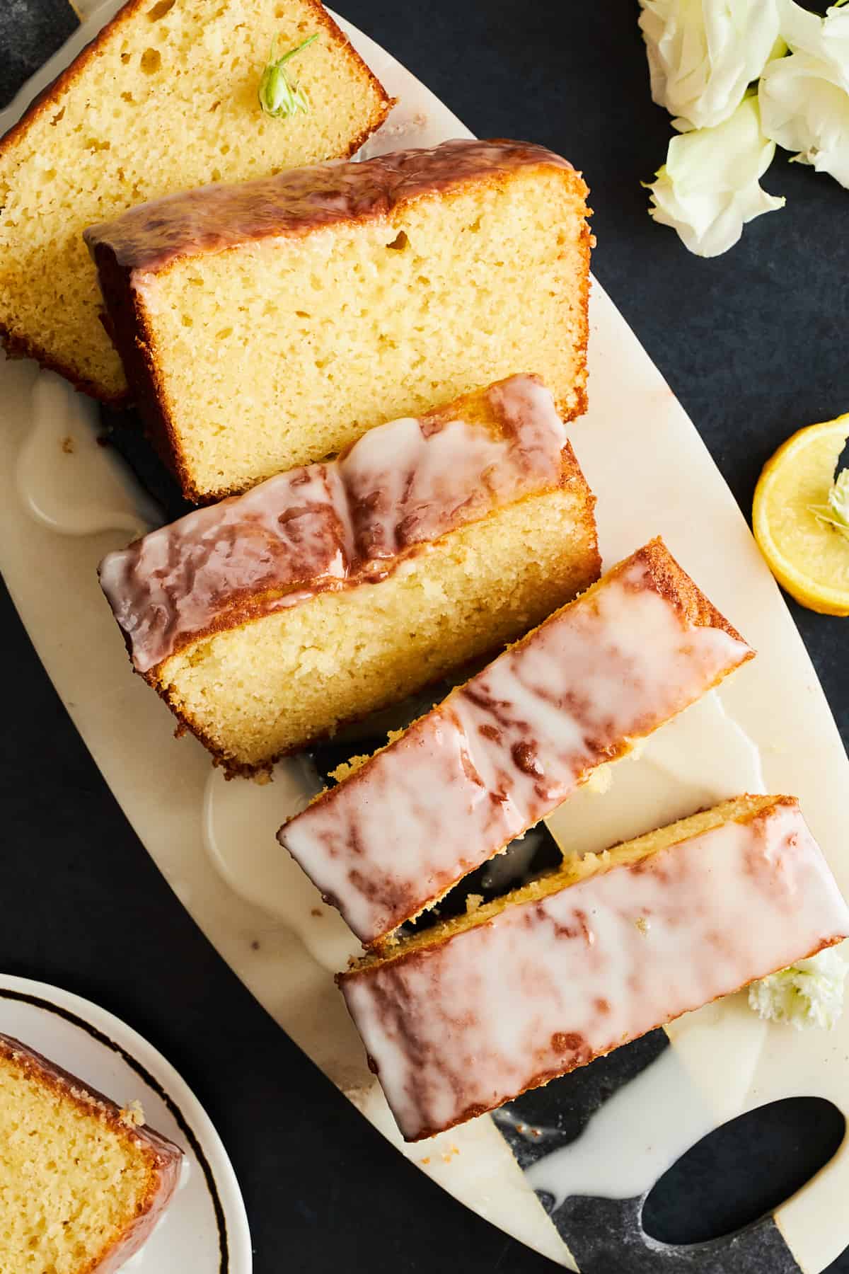 Slices of glazed Starbucks lemon loaf. 