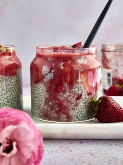 A jar of strawberry chia pudding with coconut milk.