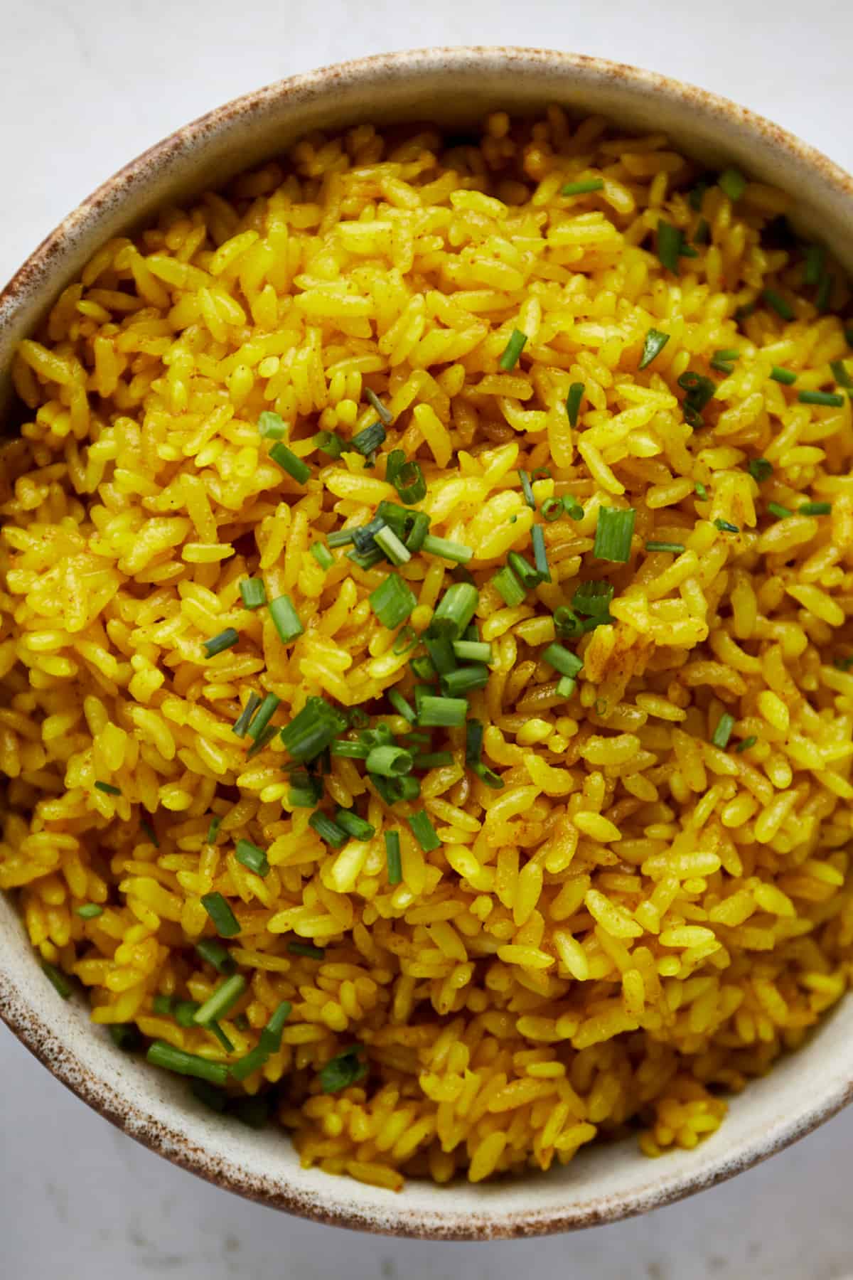 A bowl of turmeric rice. 