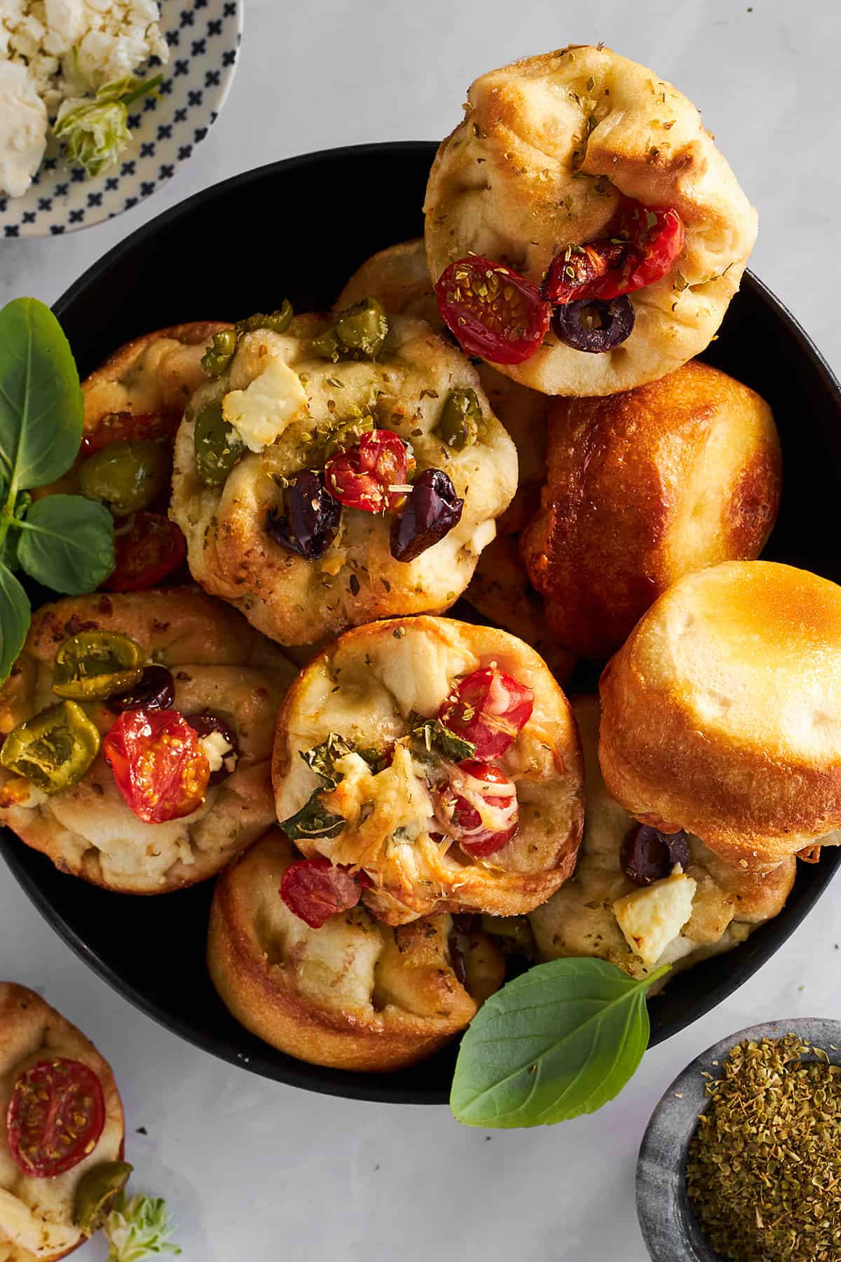 A plate of focaccia muffins. 