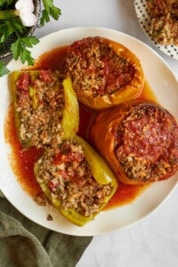 Slow cooker Mediterranean stuffed peppers with rice in a slow cooker.