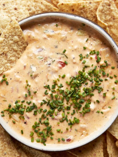 A bowl of chicken queso dip.