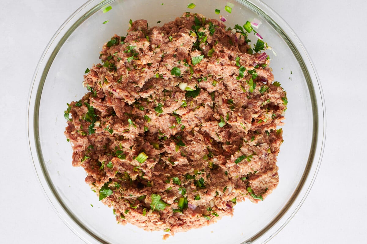 Beef kofta meatball mixture in a bowl.