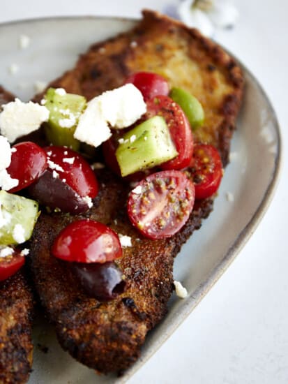 Chicken Milanese with Mediterranean Salad.