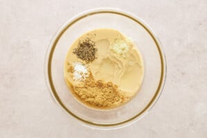 Tahini dressing ingredients in a bowl.