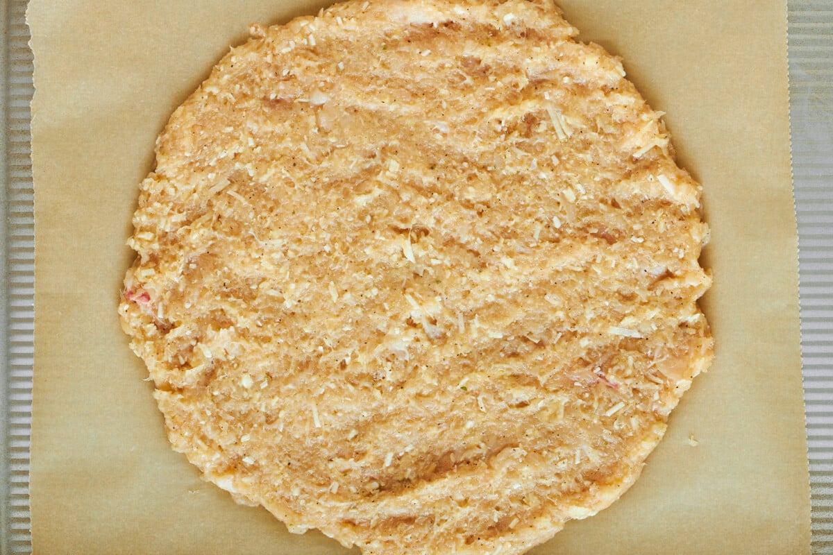 Raw chicken pizza crust.