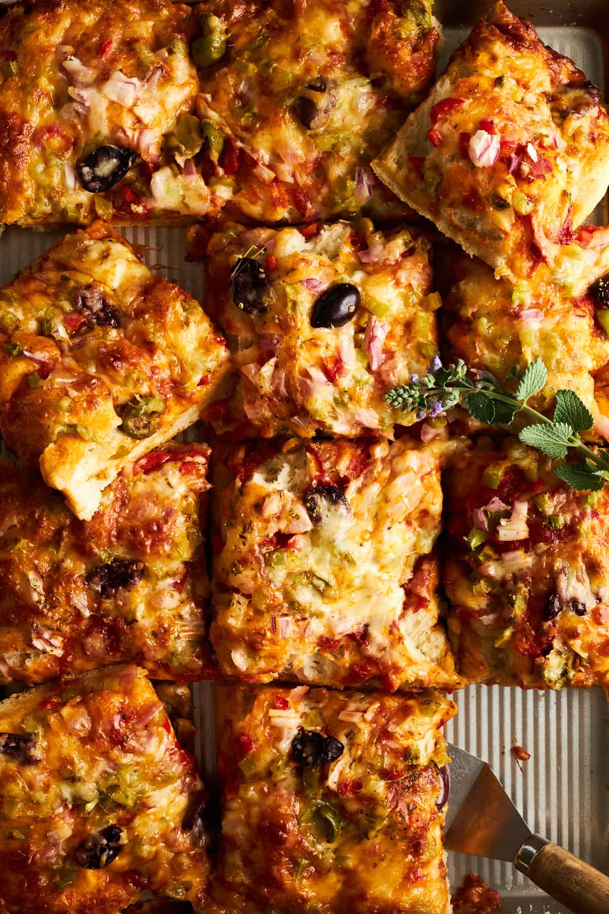 Dinner roll sheet pan pizza slices.
