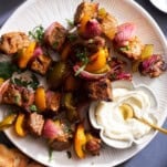 A plate of grilled steak skewers.