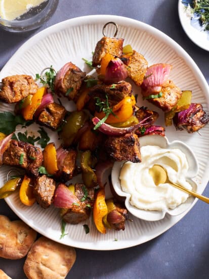 A plate of grilled steak skewers.