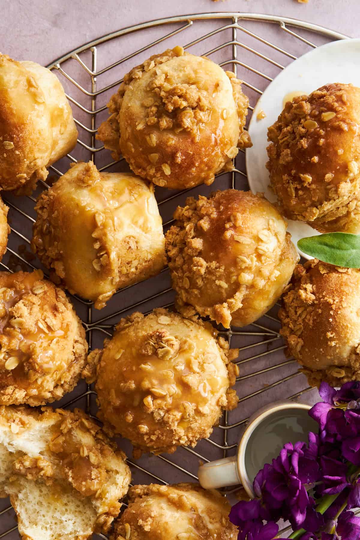 Dinner roll caramel muffins on a wire rack. 