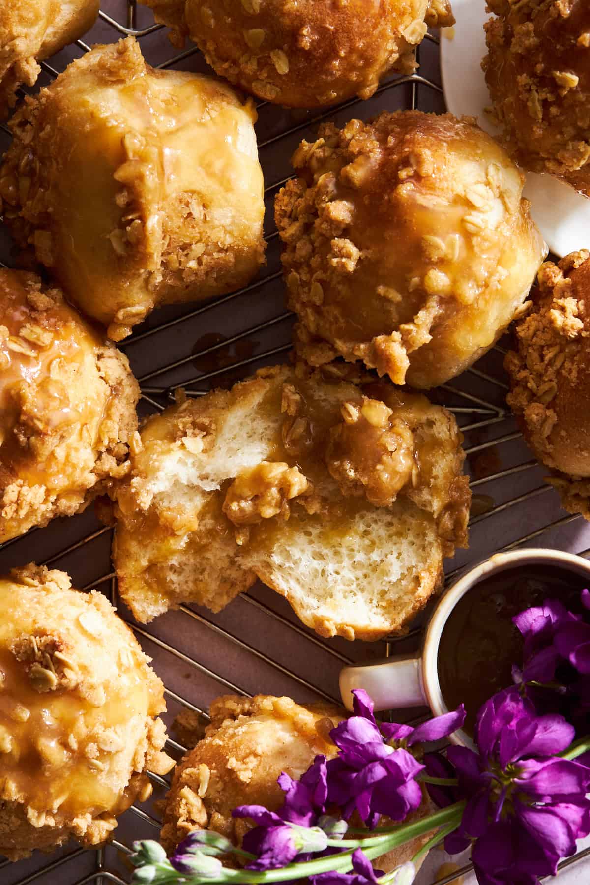 Caramel muffins made from dinner rolls with one split in half. 