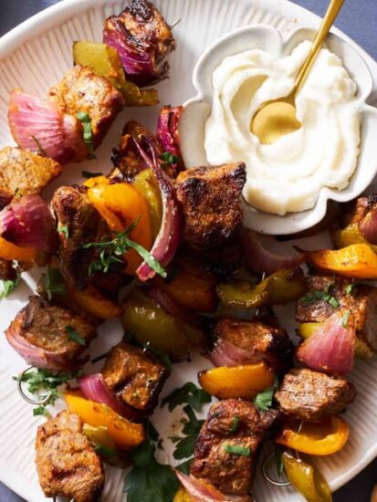 A plate of grilled steak skewers.
