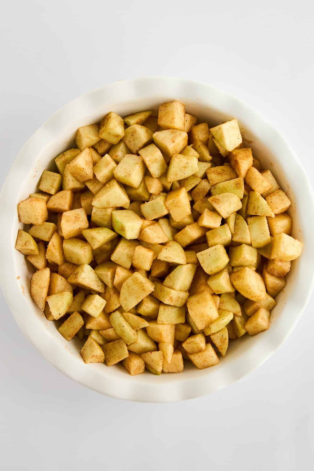 A bowl of choped apples. 