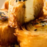 A hot honey feta phyllo roll split in half.