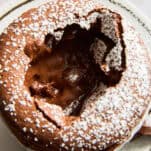 A chocolate souffle with the top cracked.