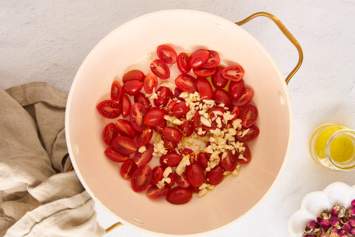 Tomatoes and garlic in a pasta pot.