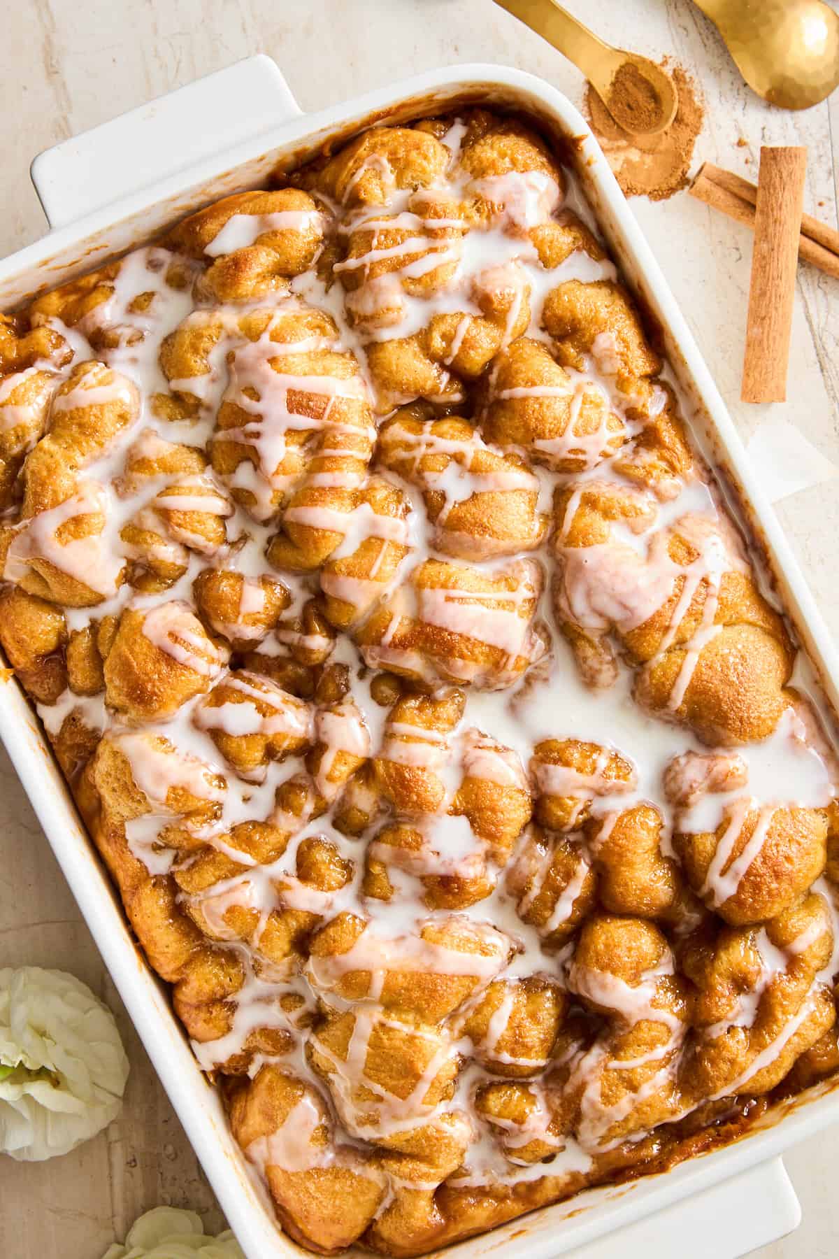 Cinnamon Roll Focaccia topped with icing. 
